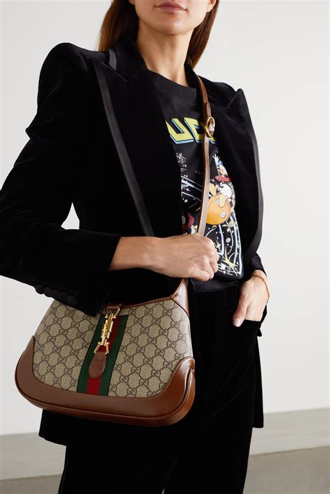gucci jackie 1961 small webbing trimmed coated canvas and leather shoulder bag net a porter