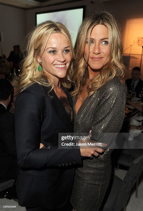 Actresses Reese Witherspoon And Jennifer Aniston Attend Elles 18th
