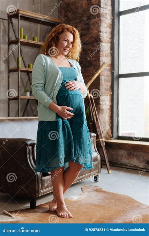 redhead pregnant woman in turquoise apparel stock image image of apartment maternity 92878231