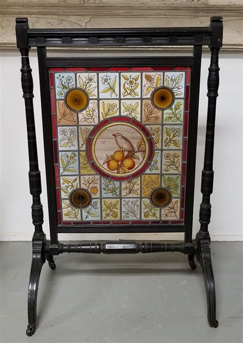 This fireplace screen is handcrafted with quality materials in real stained glass. Antique Aesthetic Stained Glass Fireplace Screen with Ebonized Wood Frame | Glass fireplace ...