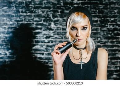Sexy Goth Girl Smokes Electronic Cigarette Stock Photo 503308252