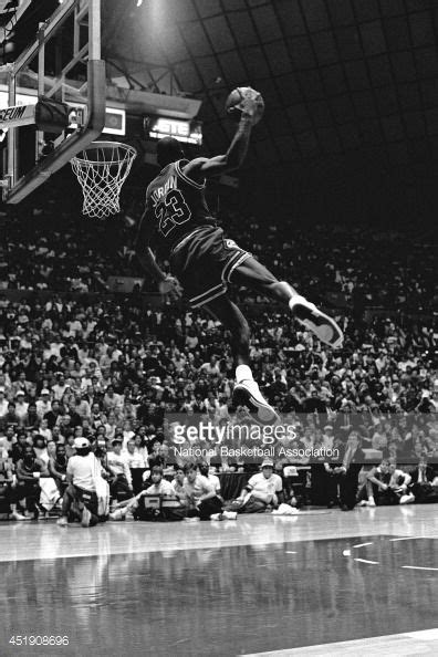 Michael Jordan Of The Chicago Bulls Attempts A Dunk During The 1987