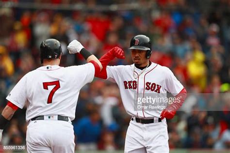 Mookie Betts Celebrates With Christian Vazquez Of The Boston Red Sox