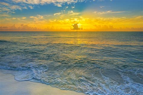 Colorful Sunset On The Tropical Beach With Beautiful Sky Clouds Stock