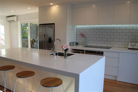 Thick Glacier White Corian Benchtop And Waterfall Ends Simply Stunning