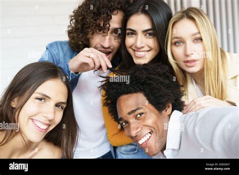 Multi Ethnic Group Of Friends Taking A Selfie Together While Having Fun