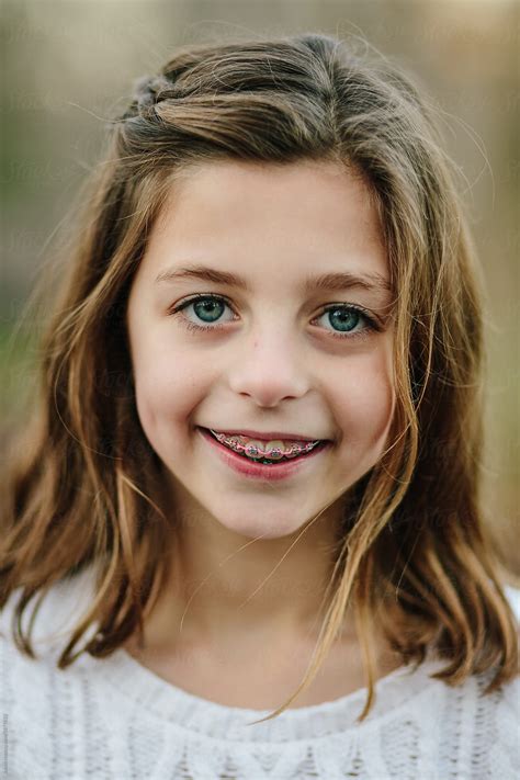 Close Up Portrait Of A Young Girl With Long Hair And Braces By Jakob