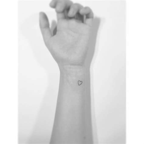 Simple Heart Tattoo Done On The Wrist Minimalistic
