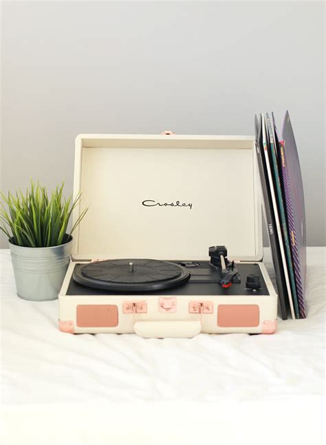 Crosley Rose Gold Record Player And Record Collection
