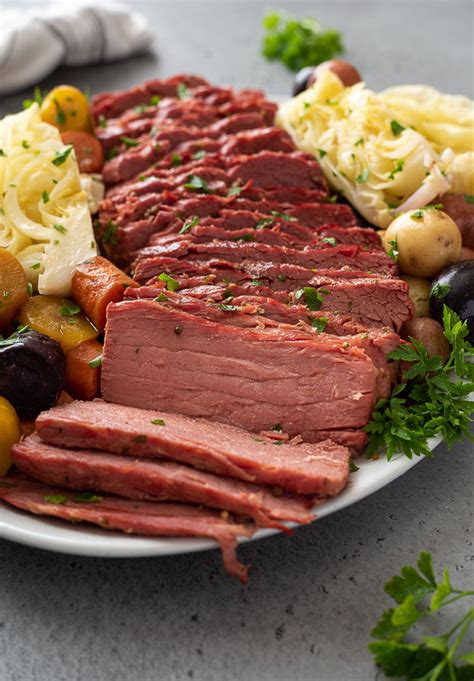 Thinly slice corned beef against the grain and serve with potatoes, carrots and cabbage, garnished with mustard and parsley, if desired. Corned Beef and Cabbage (Crock Pot or Instant Pot!) - Flavor the Moments