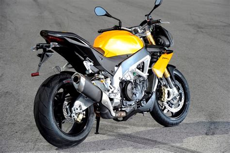 If we talk about aprilia tuono v4 engine specs then the petrol engine displacement is 1077 cc. APRILIA TUONO V4R (2011-on) Review | Specs & Prices | MCN