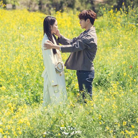 shin hye sun y l de infinite comparten un emotivo momento en un campo de flores en “angel s last