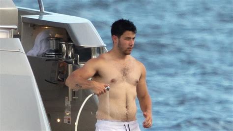this shirtless nick jonas pic has fans losing their minds read the best reactions