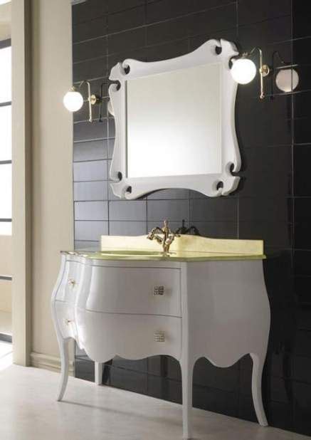 The wide black bathroom tiles with an exceptionally glossy surface contrast the bright white vanity that creates the dramatic contrast in the art deco interior. Bath room classic luxury art deco 49 Ideas for 2019 #bath ...