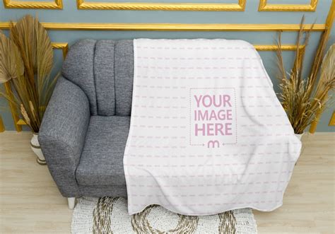 Mockup Of A Sofa Half Covered By A Blanket Mediamodifier