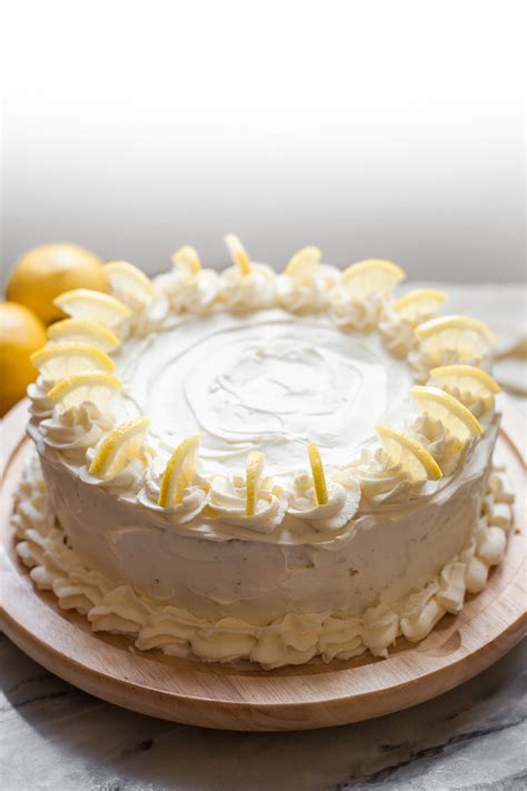Serve a slice with a warm cuppa and share with friends and family. Grain-free Lemon Cake with Whipped Cream Frosting - A Calculated Whisk
