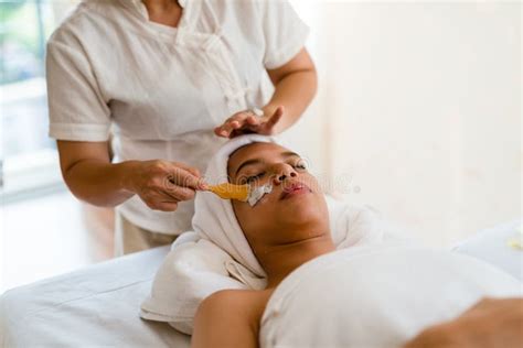 A Female Therapist Doing Facial Spatreatment Add Moisture To Th Stock Image Image Of Natural