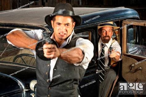 Angry 1920s Era Gangsters With Guns Stock Photo Picture And Low