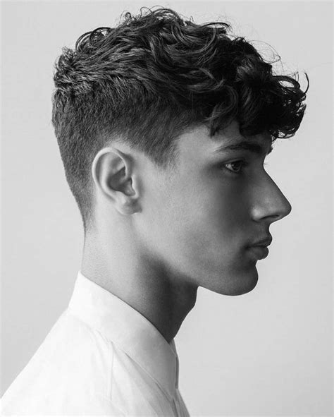 The lower part and the side parts of the head have very short hair. 96 Stylish Curly Hairstyle & Haircuts For Men 2020 Edition