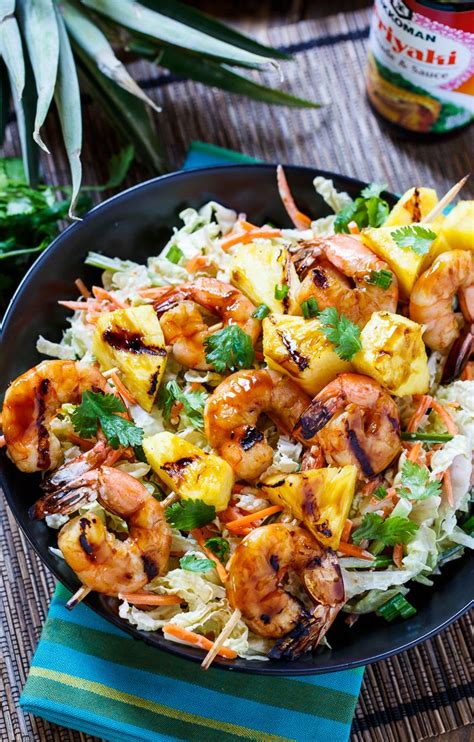 This shrimp marinade packs a huge punch of flavor and is made with ingredients that you can probably already find in your house! Grilled Teriyaki Shrimp Skewers with Asian Slaw | Skewer ...