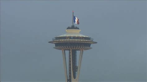French Flag Flown Atop Space Needle Given To Eiffel Tower Komo