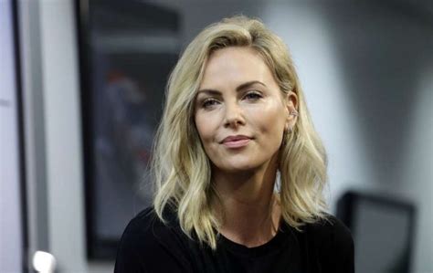 charlize theron says she is ‘shockingly single and ‘someone just needs to grow a pair and ask