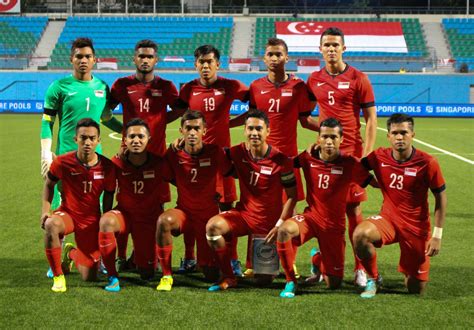 Cambodia national team line up for their national anthem. hilmi_official™: Singapore National Football Team