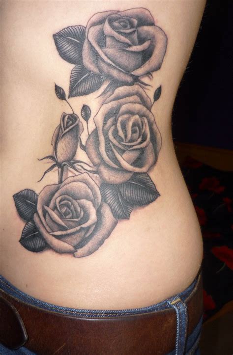 Black Ink Three Roses Tattoo On Side Rib
