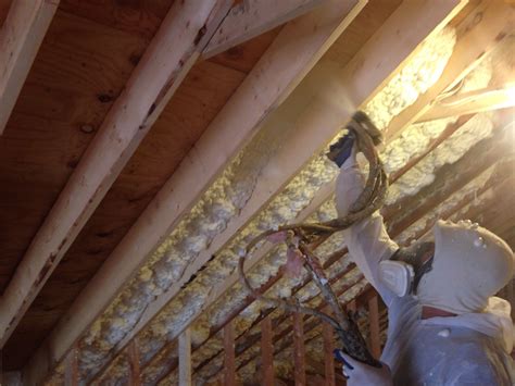 This coating needs to be replaced. Spray Foam Insulation on roof deck of old historic home in ...