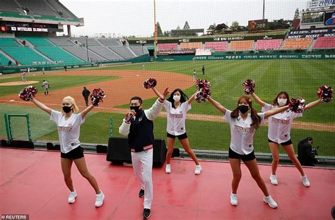 The crowd really gets into it. South Korea's baseball league opens in front of fake crowd ...