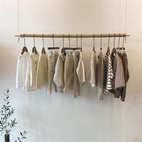 𝓈𝑒𝓇𝑒𝓃𝒾𝓉𝓎𝒾𝓃𝓈𝓅𝒶𝒸𝑒 Aesthetic Stores Clothing Rack Wooden Decor