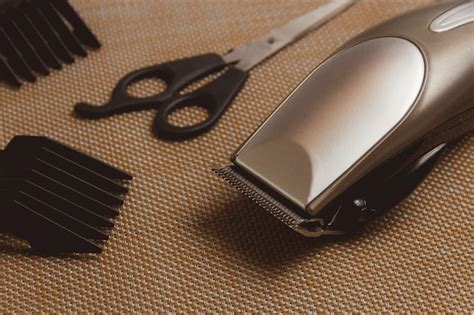 Premium Photo Stylish Professional Hair Clippers Accessories On