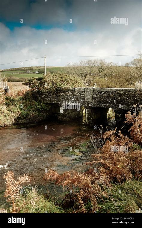 An Old Disused Historic Stone Bridge Over The River Fowey At Ninestones