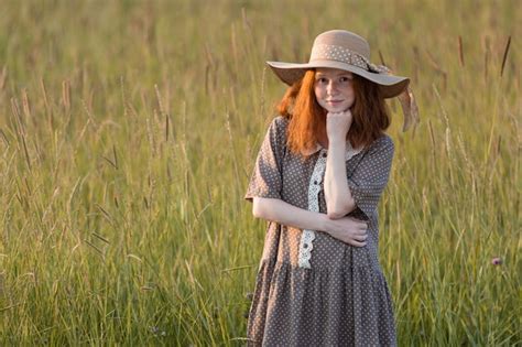 Premium Photo Redhead Model Posing In A Meadow