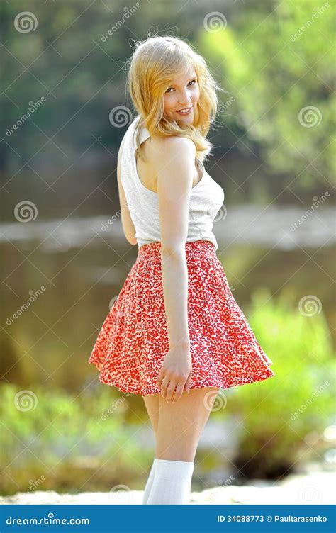 Portrait Of A Beautiful Smiling Girl In A Skirt Stock Image Image Of