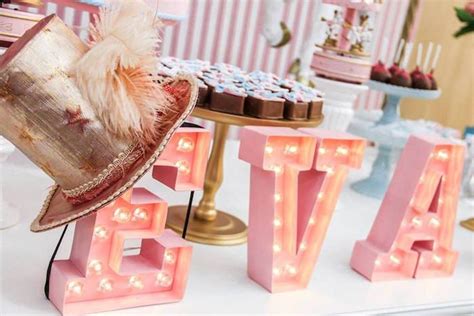 marquee letter lights from a vintage carousel birthday party via kara s party ideas