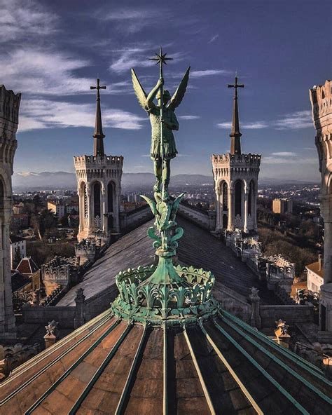 The Statue Of Saint Michael Archangel Michael On The Roof Of The