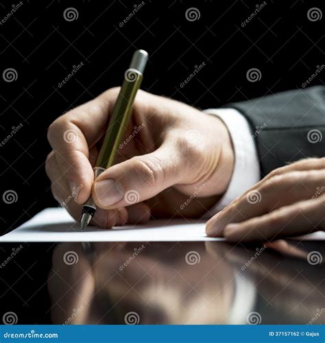 Businessman Writing On A Sheet Of White Paper Stock Photo Image Of