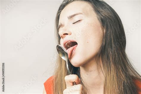 Hangry Woman Eating Spoon Stock Photo Adobe Stock