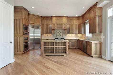 This creates a simple, clean look that unifies the space. Pin by Margie Hirst on Kitchen stuff | Light wood kitchens ...