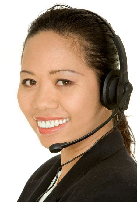 Asian Customer Service Girl Over A White Background Freestock Photos
