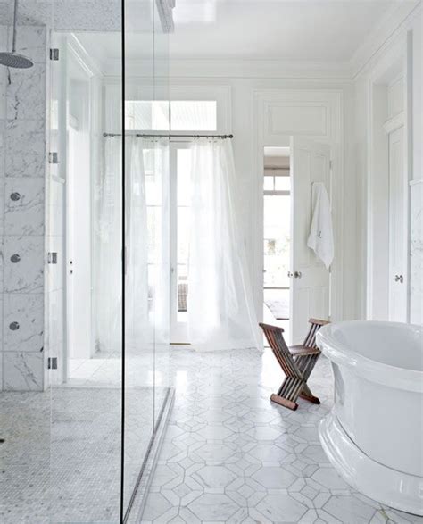 It is the classic color of the tiles that, in addition, combined with tiles of simple shapes and straight lines, you will get a bathroom that seems spacious, bright and clean. 32 white bathroom floor tile ideas and pictures 2019