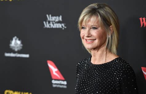 singer olivia newton john diagnosed with cancer for the third time now in her spine