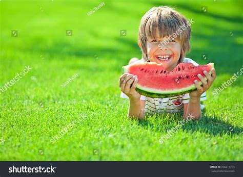 Funny Kid Eating Watermelon Outdoors Summer Stock Photo