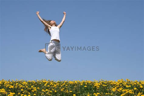 Royalty Free Image Smiling Young Woman In A Happy Jump By Anikasalsera