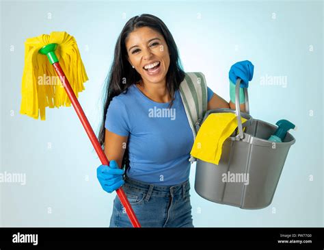 Beautiful Happy Latin Woman Holding Cleaning Equipment In Cleaning Service Professional