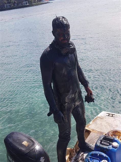 There Was An Oil Spill Recently And This Guy Covered In Oil Really