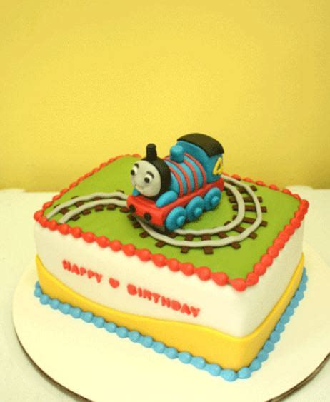 Shop wilton for all of your premium baking tools, supplies and needs! Rectangular Thomas the Train birthday cake with tracks.JPG