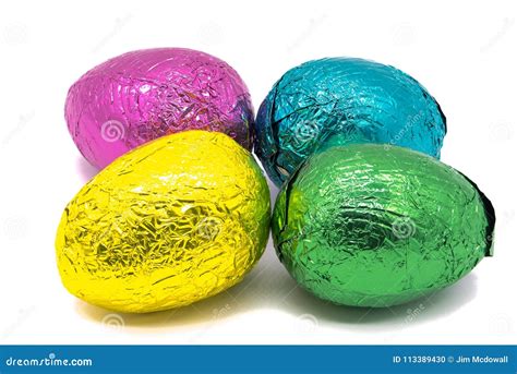 Four Colourful Foil Wrapped Easter Eggs Stock Photo Image Of Happy