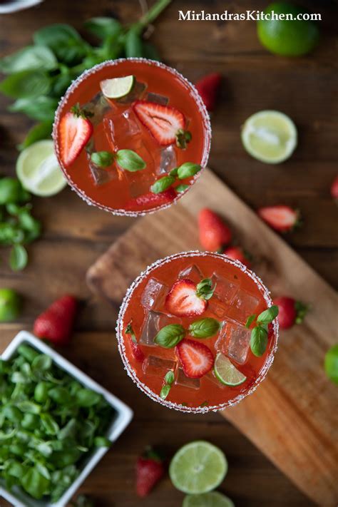 Shake vigorously and strain into a margarita glass filled with fresh ice. Strawberry Basil Margarita On The Rocks | Recipe | Margarita on the rocks, Homemade margaritas ...